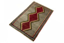 Corner detail of 2000s Shiraz rug showing border pattern and Wool pile