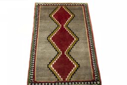 Surface texture of 2000s Shiraz rug with natural Wool and intricate pattern