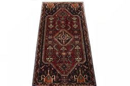 Surface texture of 2000s Shiraz rug with natural Wool and intricate pattern