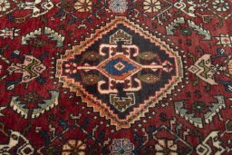 Central medallion detail of 2000s Shiraz rug from Iran / Persia