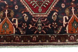 Close-up detail of 2000s Shiraz rug from Iran / Persia showing Wool weave