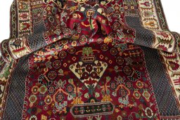 Corner detail of 2000s Shiraz rug showing border pattern and Wool pile