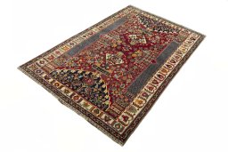 Corner detail of 2000s Shiraz rug showing border pattern and Wool pile