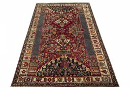 Surface texture of 2000s Shiraz rug with natural Wool and intricate pattern
