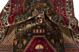 Corner detail of 2000s Shiraz rug showing border pattern and Wool pile