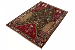 Corner detail of 2000s Shiraz rug showing border pattern and Wool pile