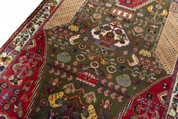 Backside of handmade 2000s Shiraz rug showing knot structure and weave density