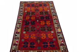 Surface texture of 2000s Shiraz rug with natural Wool and intricate pattern