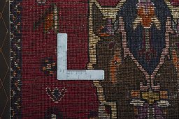 Corner detail of 2000s Shiraz rug showing border pattern and Wool pile