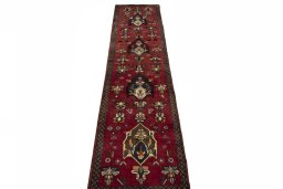 Surface texture of 2000s Shiraz rug with natural Wool and intricate pattern