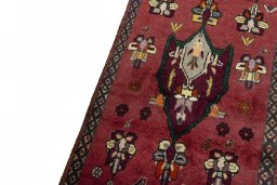 Backside of handmade 2000s Shiraz rug showing knot structure and weave density