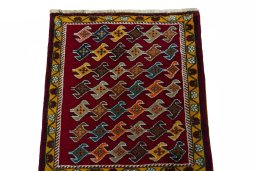 Surface texture of 2000s Shiraz rug with natural Wool and intricate pattern
