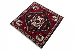 Corner detail of 2000s Shiraz rug showing border pattern and Wool pile
