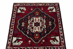 Surface texture of 2000s Shiraz rug with natural Wool and intricate pattern