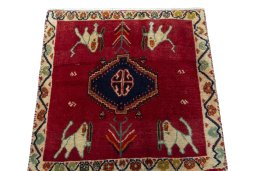 Surface texture of 2000s Shiraz rug with natural Wool and intricate pattern