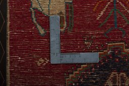 Backside of handmade 2000s Shiraz rug showing knot structure and weave density