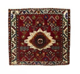 Full view of 2000s Shiraz rug from Iran / Persia, 57 × 61 cm in Red tones