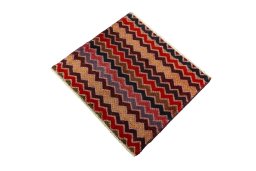 Corner detail of 2000s Shiraz rug showing border pattern and Wool pile