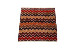 Surface texture of 2000s Shiraz rug with natural Wool and intricate pattern