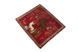 Corner detail of 2000s Shiraz rug showing border pattern and Wool pile