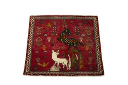 Surface texture of 2000s Shiraz rug with natural Wool and intricate pattern