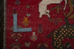 Backside of handmade 2000s Shiraz rug showing knot structure and weave density