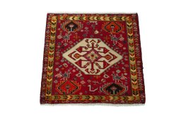 Surface texture of 2000s Shiraz rug with natural Wool and intricate pattern