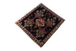 Corner detail of 2000s Shiraz rug showing border pattern and Wool pile