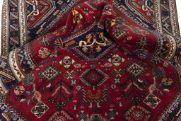 Close-up detail of 2000s Shiraz rug from Iran / Persia showing Wool weave