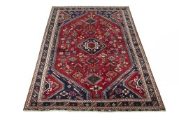 Surface texture of 2000s Shiraz rug with natural Wool and intricate pattern