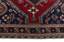 Close-up detail of 2000s Shiraz rug from Iran / Persia showing Wool weave