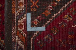 Close-up detail of 2000s Shiraz rug from Iran / Persia showing Wool weave