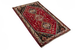 Close-up detail of 2000s Shiraz rug from Iran / Persia showing Wool weave