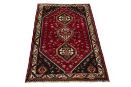Surface texture of 2000s Shiraz rug with natural Wool and intricate pattern