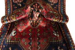 Close-up detail of 2000s Shiraz rug from Iran / Persia showing Wool weave