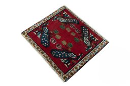 Corner detail of 2000s Shiraz rug showing border pattern and Wool pile