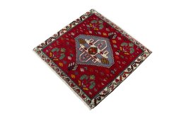 Corner detail of 2000s Shiraz rug showing border pattern and Wool pile