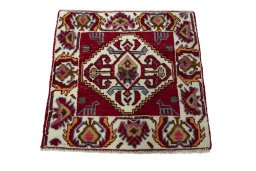 Surface texture of 2000s Shiraz rug with natural Wool and intricate pattern