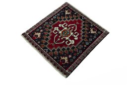 Corner detail of 2000s Shiraz rug showing border pattern and Wool pile