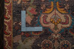 Backside of handmade 2000s Shiraz rug showing knot structure and weave density