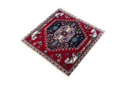 Corner detail of 2000s Shiraz rug showing border pattern and Wool pile