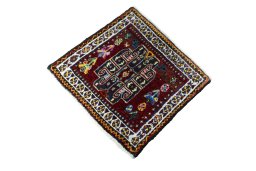 Corner detail of 2000s Shiraz rug showing border pattern and Wool pile