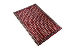 Corner detail of 2000s Shiraz rug showing border pattern and Wool pile
