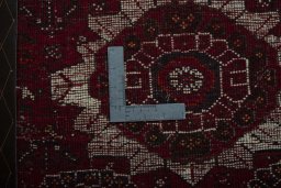 Backside of handmade 2000s Shiraz rug showing knot structure and weave density
