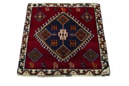 Surface texture of 2000s Shiraz rug with natural Wool and intricate pattern