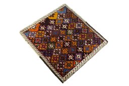Corner detail of 2000s Shiraz rug showing border pattern and Wool pile