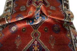 Corner detail of 2000s Shiraz rug showing border pattern and Wool pile