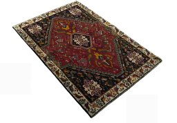 Close-up detail of 2000s Shiraz rug from Iran / Persia showing Wool weave