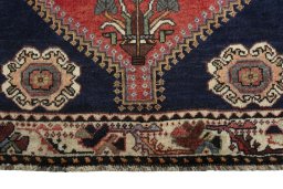 Close-up detail of 2000s Shiraz rug from Iran / Persia showing Wool weave