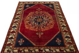 Surface texture of 2000s Shiraz rug with natural Wool and intricate pattern